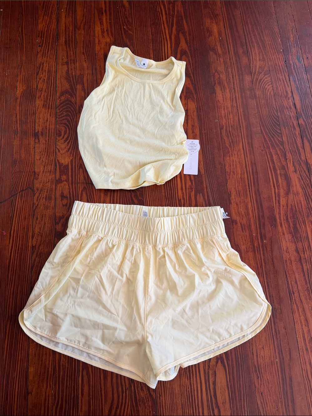 Yogalicious Women's Athletic Shorts and Tank Set in Pale Yellow